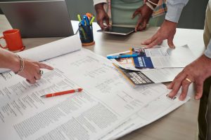 Document spread out on a meeting table