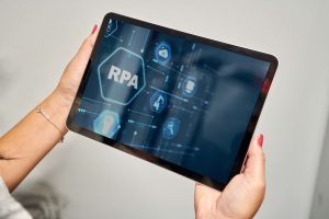 A tablet with the acronym RPA on the screen